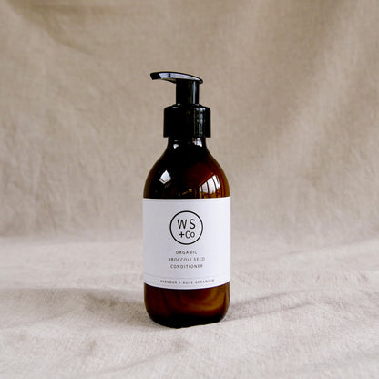 Bottle of WS+Co organic broccoli seed conditioner with pump
