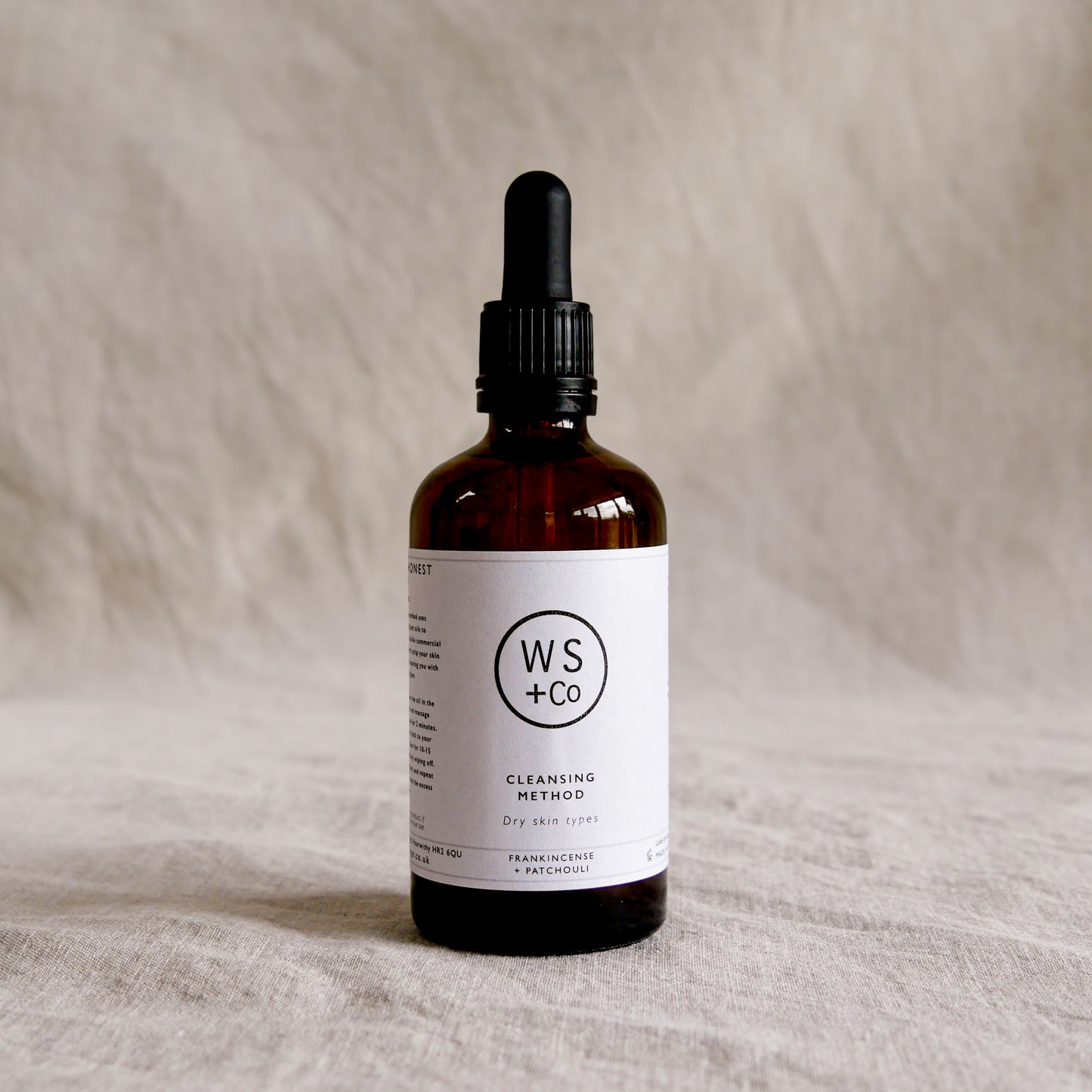 Bottle with dropper labeled 'WS+Co' Dry Skin
